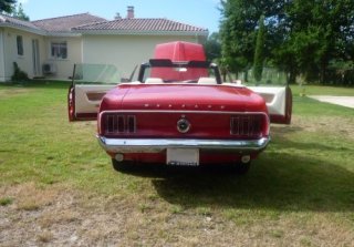 Location FORD MUSTANG 1969 ROUGE