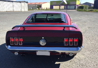 Location Ford Mustang Mach 1 1969 Rouge
